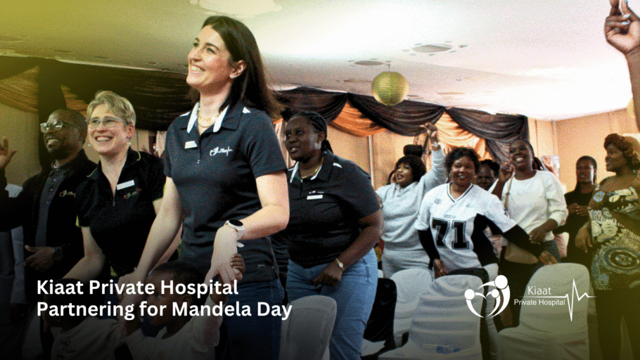Partnering for Hope | Mandela Day with Kiaat Private Hospital A group of smiling Kiaat Private Hospital staff members dancing and celebrating alongside community members for Mandela Day
